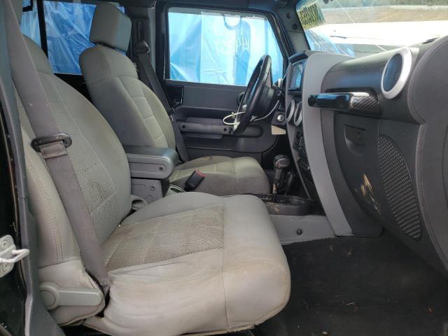 1J4GA59129L718689 - 2009 JEEP WRANGLER U SAHARA BLACK photo 7