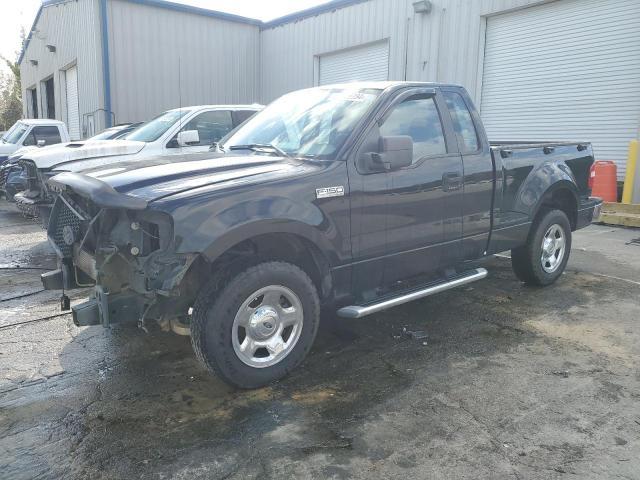 1FTRF02W65KC75312 - 2005 FORD F150 BLACK photo 1