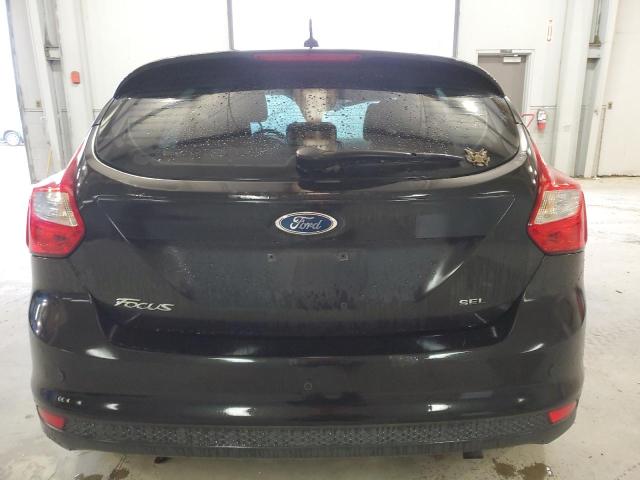 1FAHP3M23CL122341 - 2012 FORD FOCUS SEL BLACK photo 6