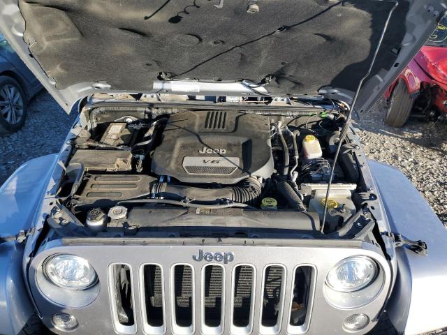 1C4BJWEGXJL847011 - 2018 JEEP WRANGLER U SAHARA SILVER photo 12