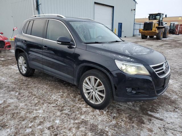 WVGBV95N19W546525 - 2009 VOLKSWAGEN TIGUAN SE BLACK photo 4