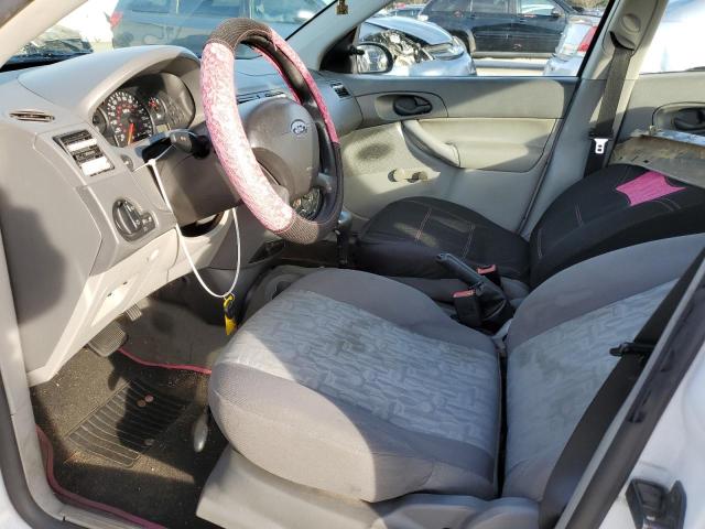 1FAFP34N65W279834 - 2005 FORD FOCUS ZX4 WHITE photo 7