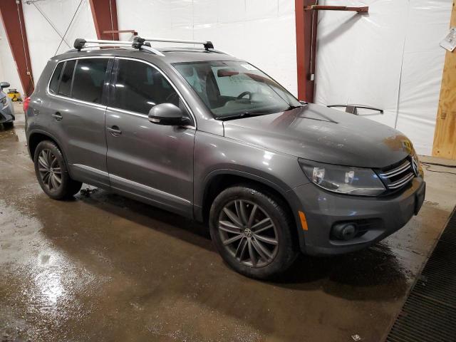 WVGBV3AX4EW534562 - 2014 VOLKSWAGEN TIGUAN S SILVER photo 4