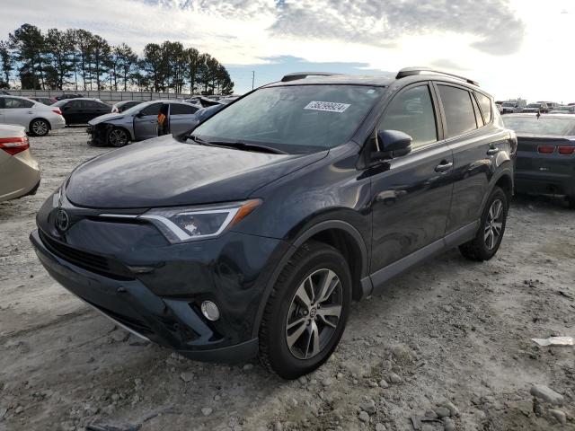 2T3WFREV5JW469602 - 2018 TOYOTA RAV4 ADVENTURE BLUE photo 1