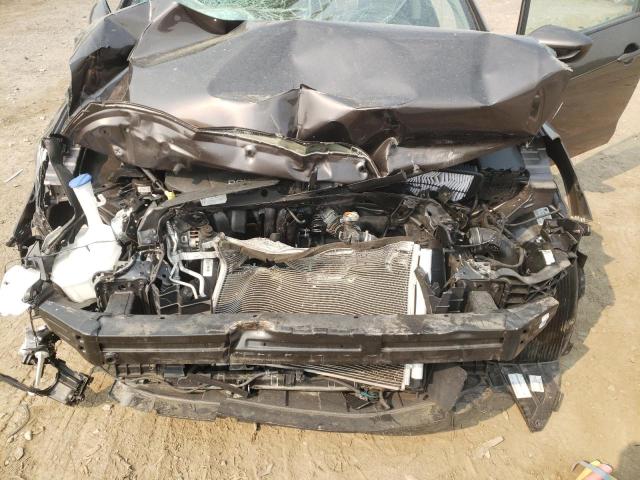 3KPFK4A72JE204413 - 2018 KIA FORTE LX BROWN photo 11