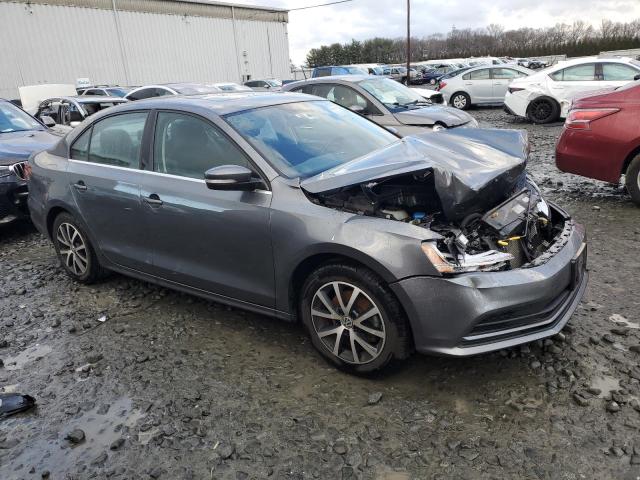 3VWB67AJ3HM392467 - 2017 VOLKSWAGEN JETTA SE GRAY photo 4