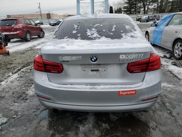 WBA8E5G58JNV03411 - 2018 BMW 320 XI GRAY photo 6