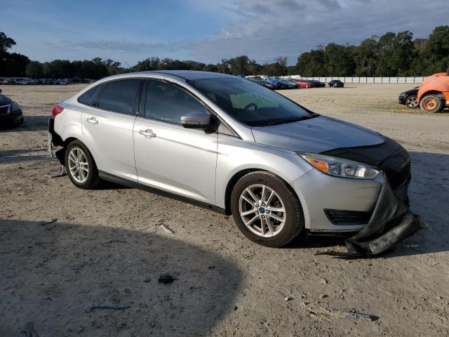 1FADP3F23FL372761 - 2015 FORD FOCUS SE SILVER photo 4