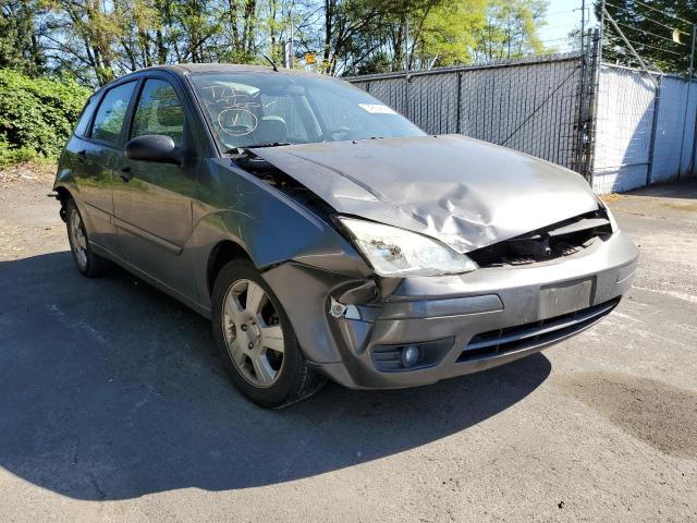 3FAFP37N25R157762 - 2005 FORD FOCUS ZX5 GRAY photo 1