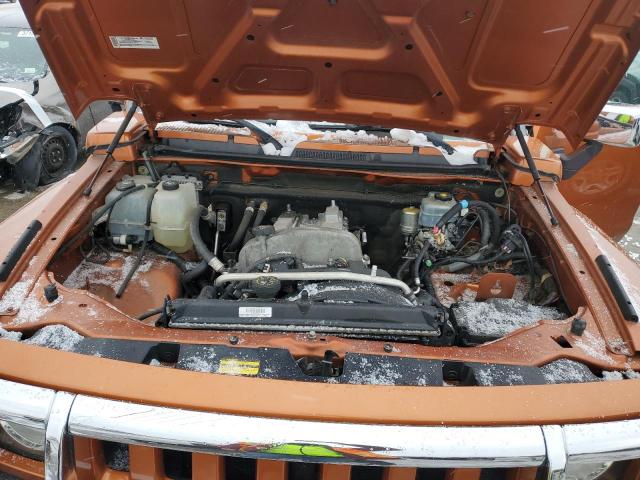 5GTDN13E878143637 - 2007 HUMMER H3 ORANGE photo 12