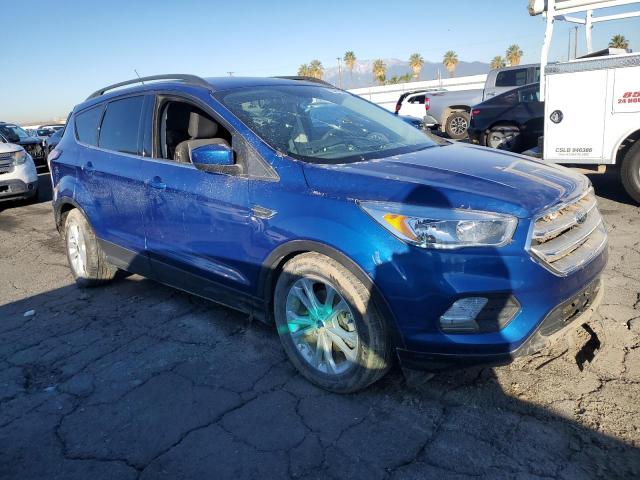 1FMCU0GD0JUC95083 - 2018 FORD ESCAPE SE BLUE photo 4