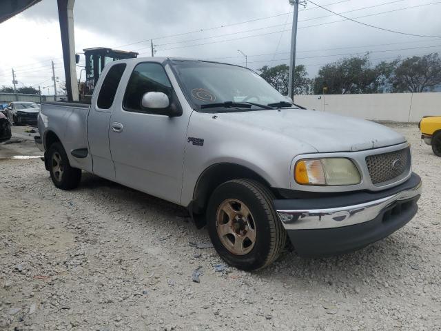 1FTZX07251KA61764 - 2001 FORD F150 SILVER photo 4