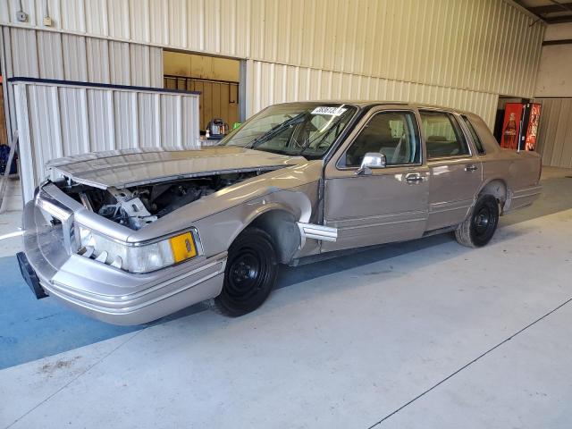 1LNLM82W5RY767161 - 1994 LINCOLN TOWN CAR SIGNATURE GOLD photo 1