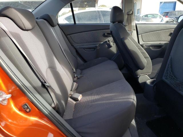 KNADE223496487605 - 2009 KIA RIO BASE ORANGE photo 10