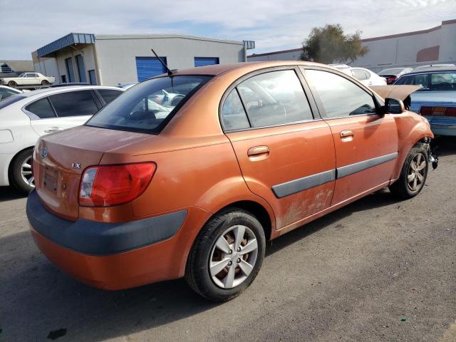 KNADE223496487605 - 2009 KIA RIO BASE ORANGE photo 3