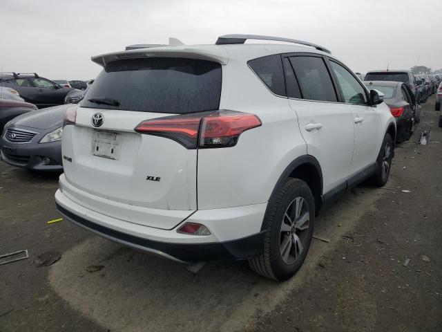 2T3WFREV8HW387180 - 2017 TOYOTA RAV4 XLE WHITE photo 3