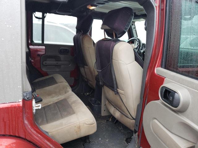 1J4HA5H12AL129622 - 2010 JEEP WRANGLER U SAHARA MAROON photo 11