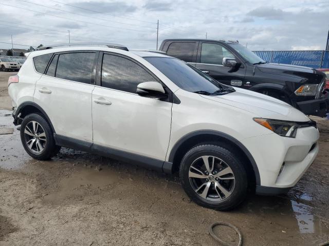 JTMWFREV9JJ210898 - 2018 TOYOTA RAV4 ADVENTURE WHITE photo 4