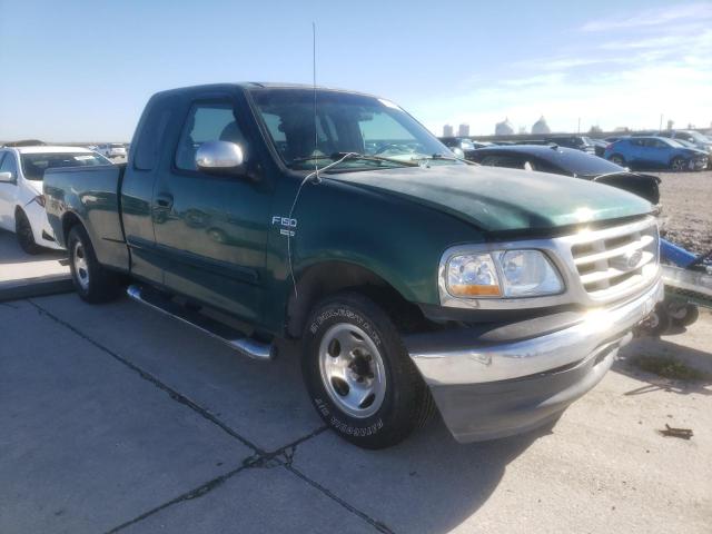 1FTRX17L5XNB63541 - 1999 FORD F150 GREEN photo 4