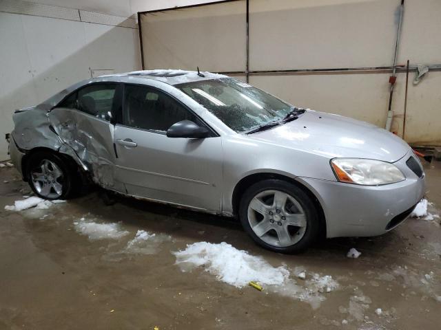 1G2ZG57B894218060 - 2009 PONTIAC G6 SILVER photo 4