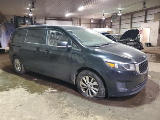 KNDMB5C13G6160636 - 2016 KIA SEDONA LX BLACK photo 4