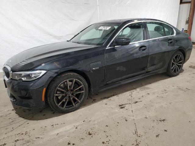 3MW5P9J0XN8C65832 - 2022 BMW 330XE Negro foto 1