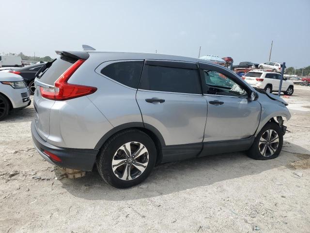 2HKRW5H32JH407596 - 2018 HONDA CR-V LX SILVER photo 3