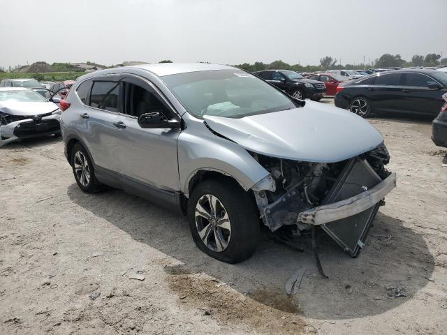 2HKRW5H32JH407596 - 2018 HONDA CR-V LX SILVER photo 4