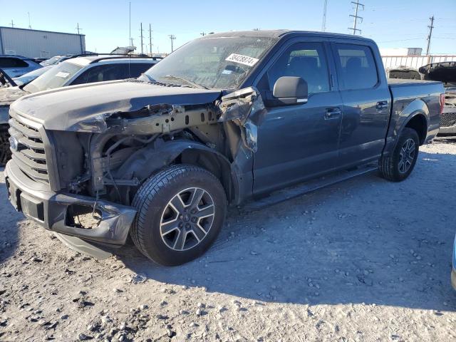 1FTEW1CF8FKE28132 - 2015 FORD F150 SUPERCREW GRAY photo 1