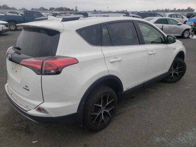 JTMJJREV9JD247991 - 2018 TOYOTA RAV4 HV SE WHITE photo 3