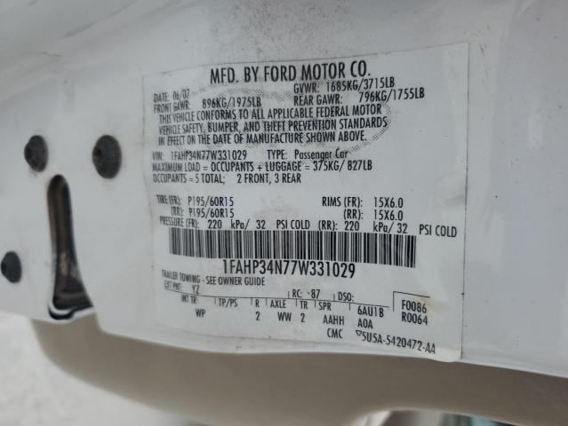 1FAHP34N77W331029 - 2007 FORD FOCUS ZX4 WHITE photo 12