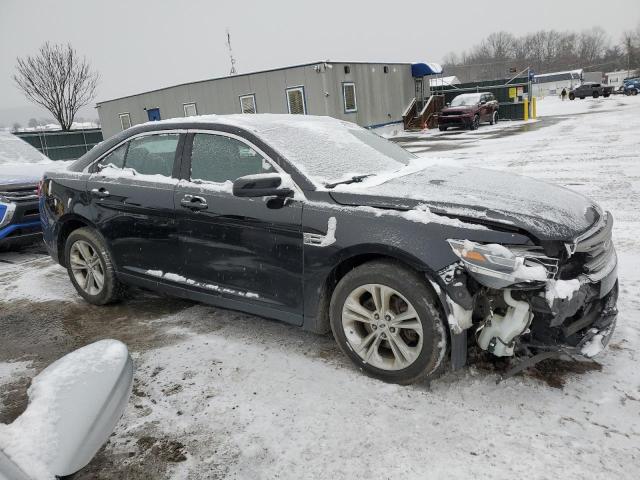 1FAHP2E80HG114209 - 2017 FORD TAURUS SEL BLACK photo 4