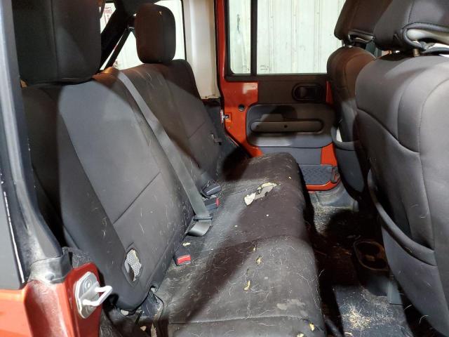 1J4GA59189L735643 - 2009 JEEP WRANGLER U SAHARA ORANGE photo 10