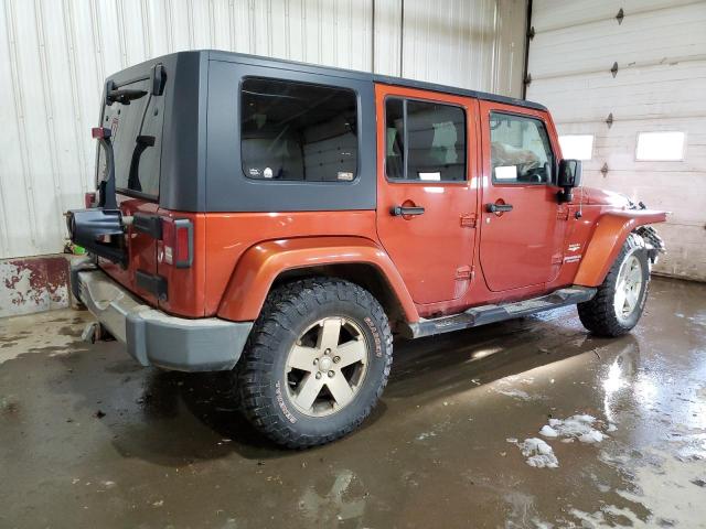1J4GA59189L735643 - 2009 JEEP WRANGLER U SAHARA ORANGE photo 3