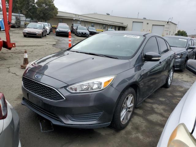 1FADP3F27HL304370 - 2017 FORD FOCUS SE GRAY photo 1