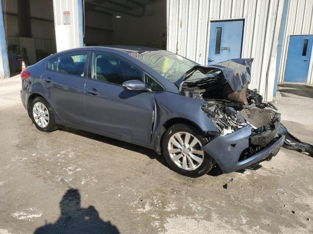 KNAFX4A61F5334210 - 2015 KIA FORTE LX BLUE photo 4