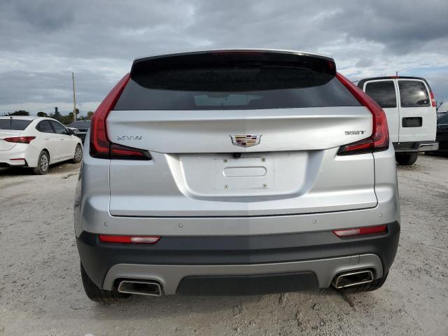 1GYFZCR49MF081049 - 2021 CADILLAC XT4 PREMIUM LUXURY SILVER photo 6