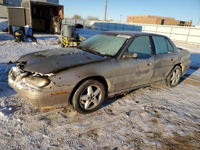 1G2NE52T0VM530274 - 1997 PONTIAC GRAND AM SE TAN photo 1