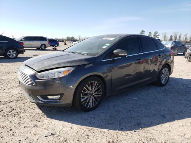 1FADP3J21HL238647 - 2017 FORD FOCUS TITANIUM GRAY photo 1