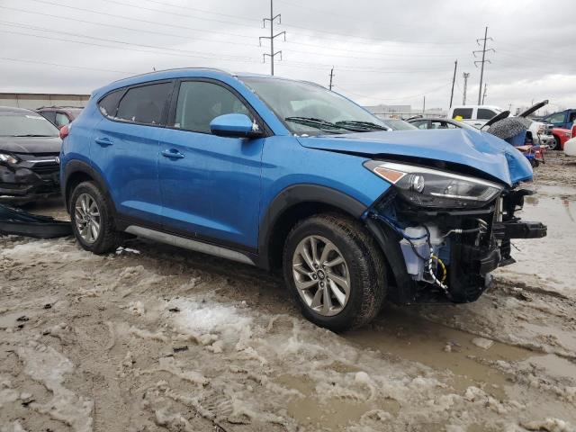 KM8J3CA43HU416123 - 2017 HYUNDAI TUCSON LIMITED BLUE photo 4