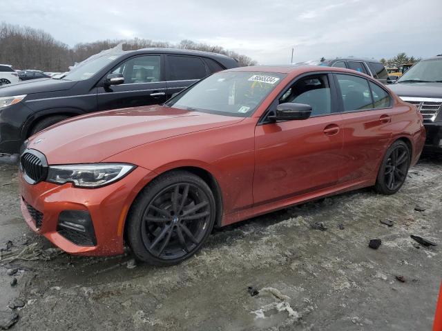 3MW5R7J07M8B98863 - 2021 BMW 330XI ORANGE photo 1