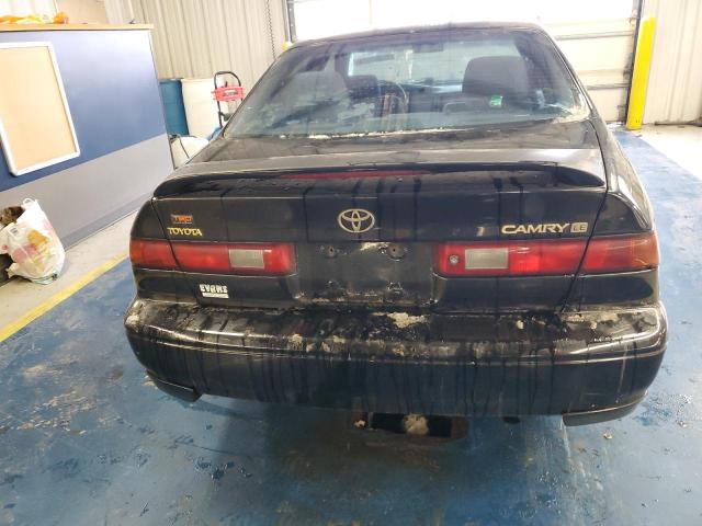 JT2BG22KXX0321576 - 1999 TOYOTA CAMRY LE BLACK photo 6