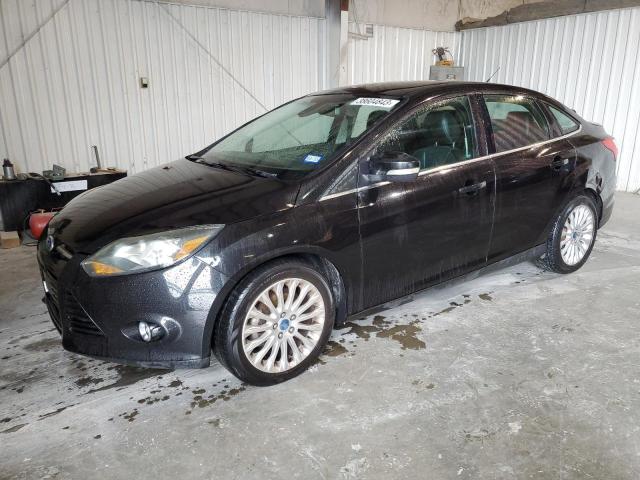 1FAHP3J21CL479926 - 2012 FORD FOCUS TITANIUM BLACK photo 1