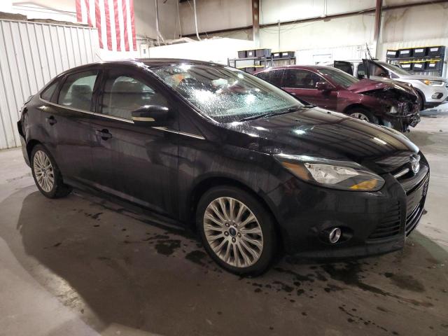 1FAHP3J21CL479926 - 2012 FORD FOCUS TITANIUM BLACK photo 4