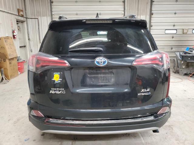 JTMRJREV6JD194654 - 2018 TOYOTA RAV4 HV LE BLACK photo 6