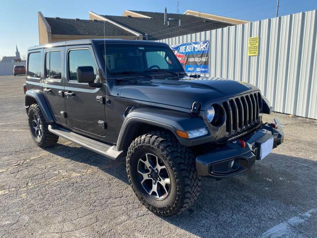 1C4HJXEN0JW332662 - 2018 JEEP WRANGLER U SAHARA BLACK photo 1