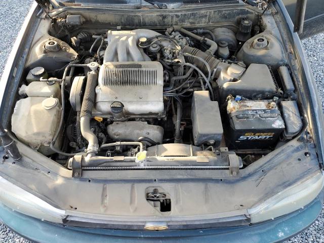 JT2VK13E9P0217062 - 1993 TOYOTA CAMRY XLE GREEN photo 11