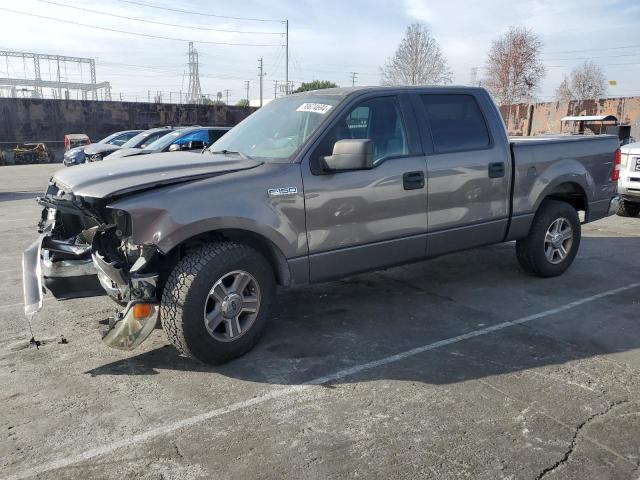 1FTPW12515KD02193 - 2005 FORD F150 SUPERCREW GRAY photo 1