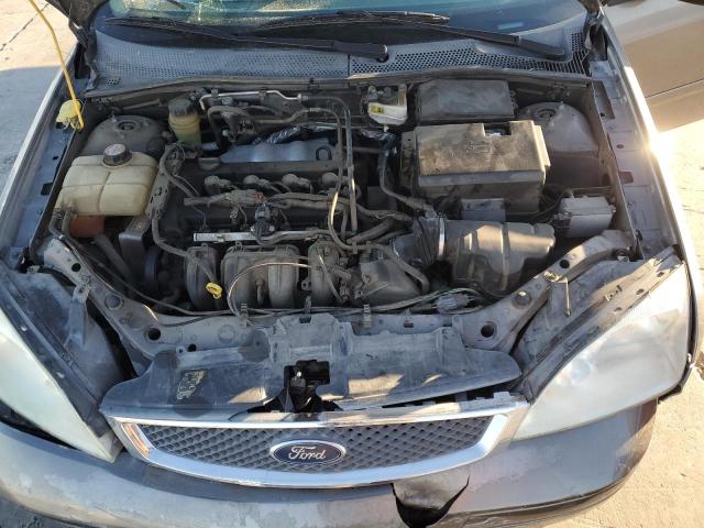 1FAHP34N75W175197 - 2005 FORD FOCUS ZX4 GRAY photo 11