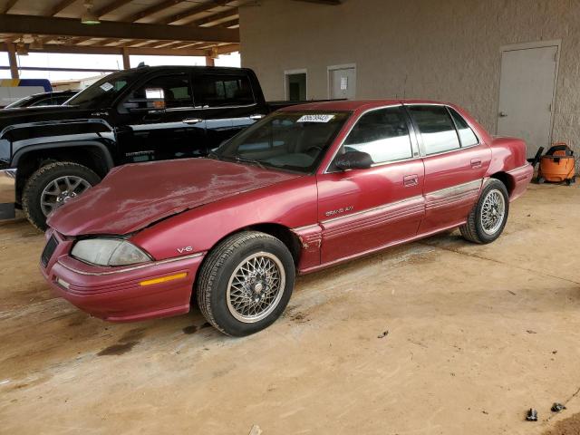 1G2NE55M1RC805280 - 1994 PONTIAC GRAND AM SE MAROON photo 1